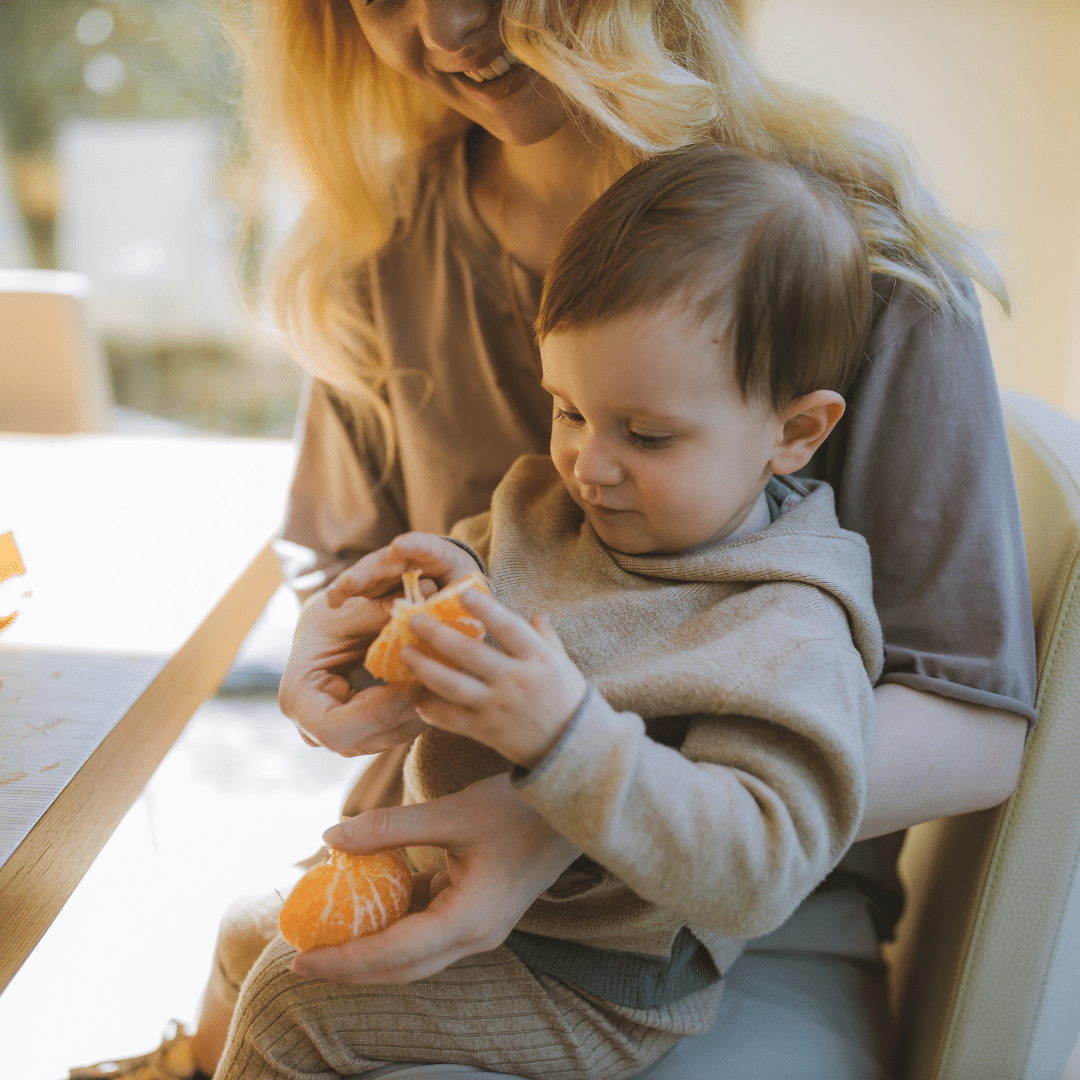 Image: Mom feeding child